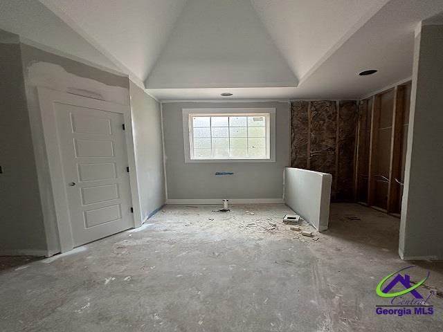 bathroom with lofted ceiling