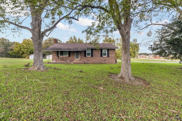 ranch-style home with a front yard