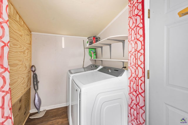 laundry room featuring independent washer and dryer, crown molding, and dark wood-type flooring