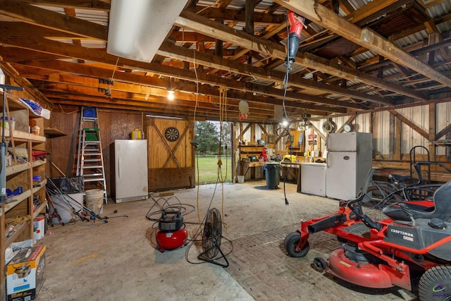 garage with white refrigerator