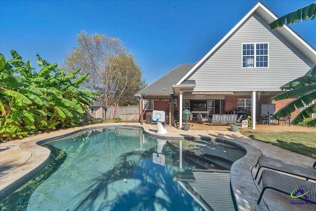 view of pool featuring outdoor lounge area and a patio area