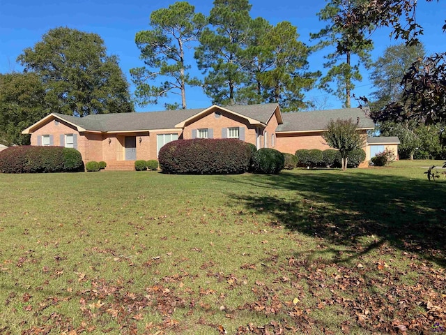 ranch-style house with a front lawn