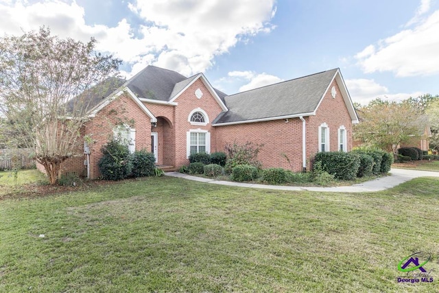 view of property with a front lawn