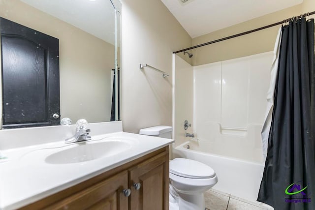 full bathroom with tile patterned floors, vanity, toilet, and shower / tub combo with curtain