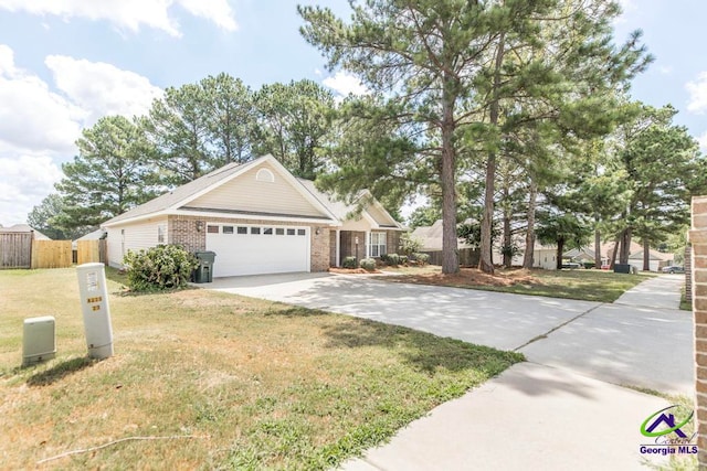 view of front of house featuring a garage and a front yard