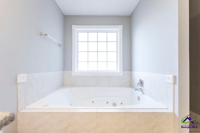 bathroom with tiled tub