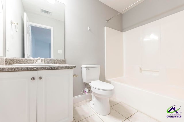 full bathroom with tile patterned floors, vanity, toilet, and shower / tub combination