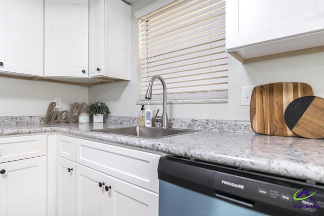 105 Westcliff Cir, Warner Robins, GA 31093 - kitchen with a sink, dishwasher, light countertops, and white cabinetry