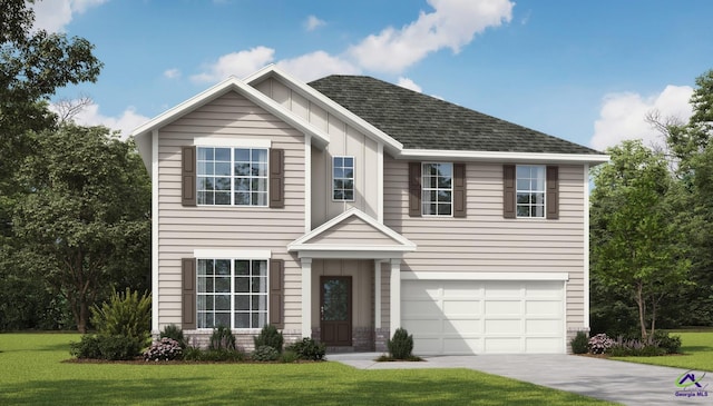 view of front facade featuring a front yard and a garage