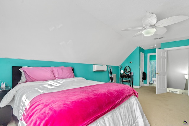 carpeted bedroom with vaulted ceiling, ceiling fan, and an AC wall unit