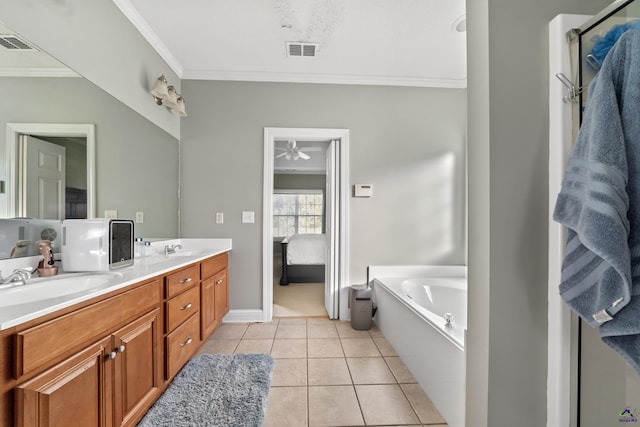 bathroom featuring tile patterned floors, vanity, ceiling fan, crown molding, and a relaxing tiled tub