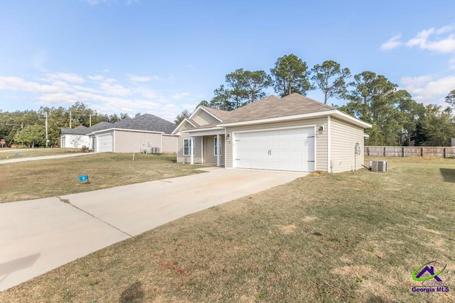 ranch-style house with a garage and a front lawn