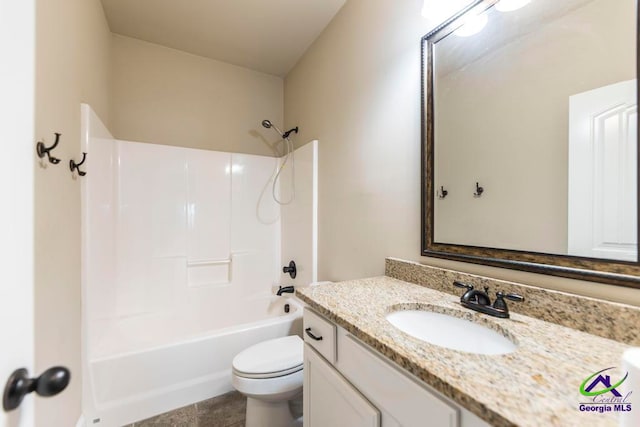 full bathroom with vanity, toilet, and shower / washtub combination