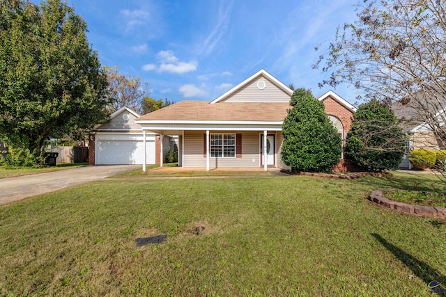 view of front of house featuring a front lawn and a garage