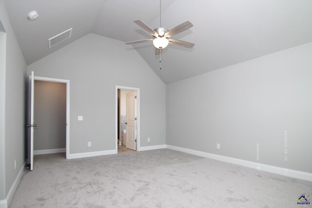 unfurnished bedroom with light carpet, ceiling fan, and lofted ceiling