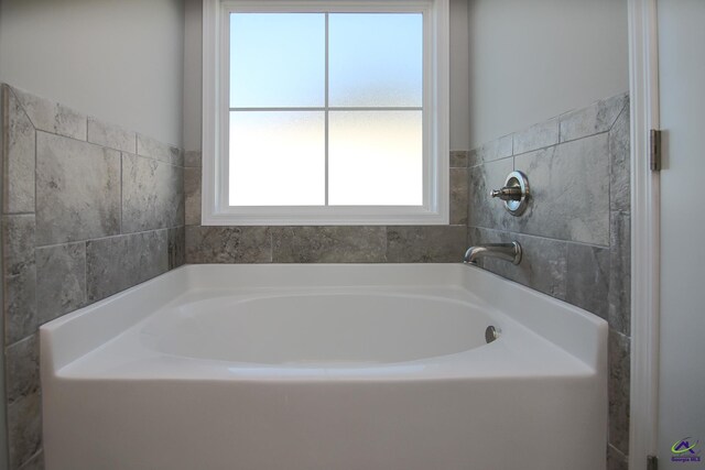 bathroom with a bath