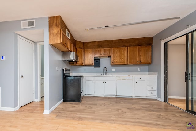 kitchen with dishwasher, light wood-type flooring, electric stove, and sink