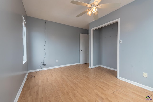 spare room with ceiling fan and light hardwood / wood-style flooring