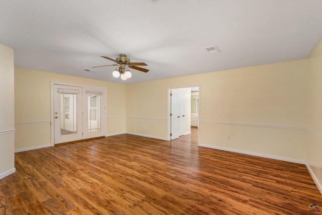 unfurnished room featuring ceiling fan and wood-type flooring