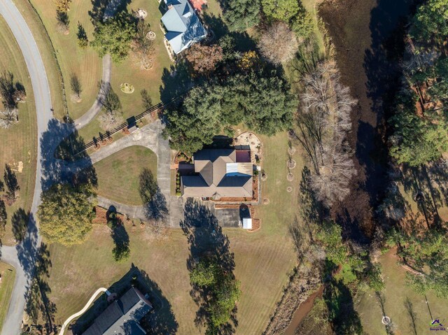 birds eye view of property featuring a rural view