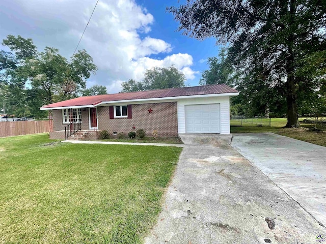 ranch-style house featuring an attached garage, brick siding, fence, crawl space, and a front yard