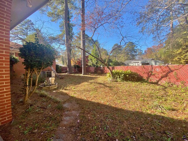 view of yard with fence