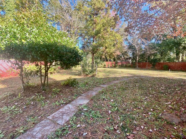 view of yard with fence