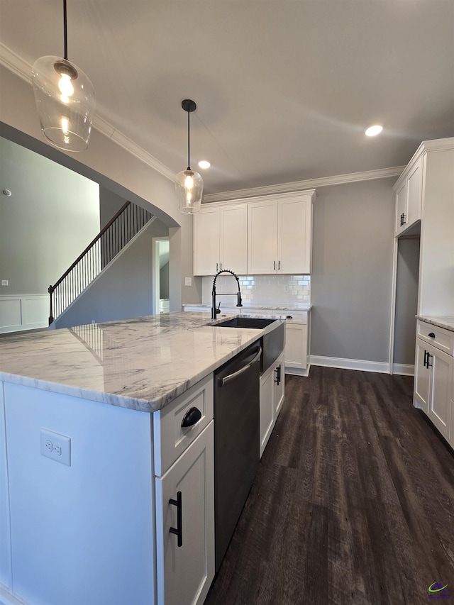 kitchen featuring white cabinetry, dishwasher, and light stone countertops