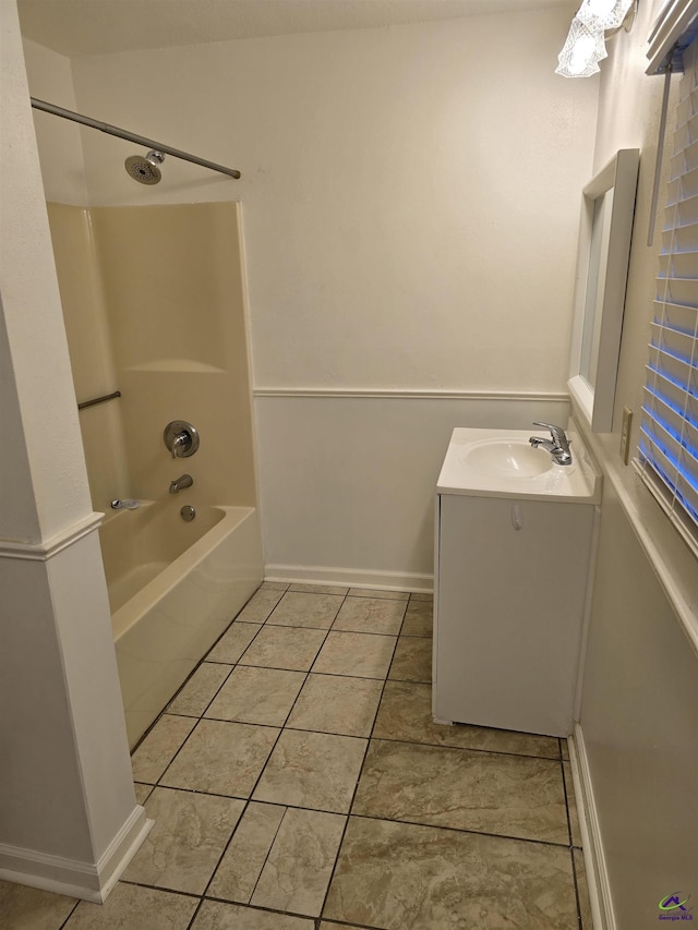 bathroom featuring vanity, tile patterned floors, and shower / bathtub combination