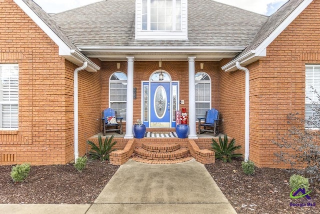 entrance to property with covered porch