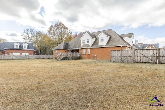 view of yard featuring a wooden deck