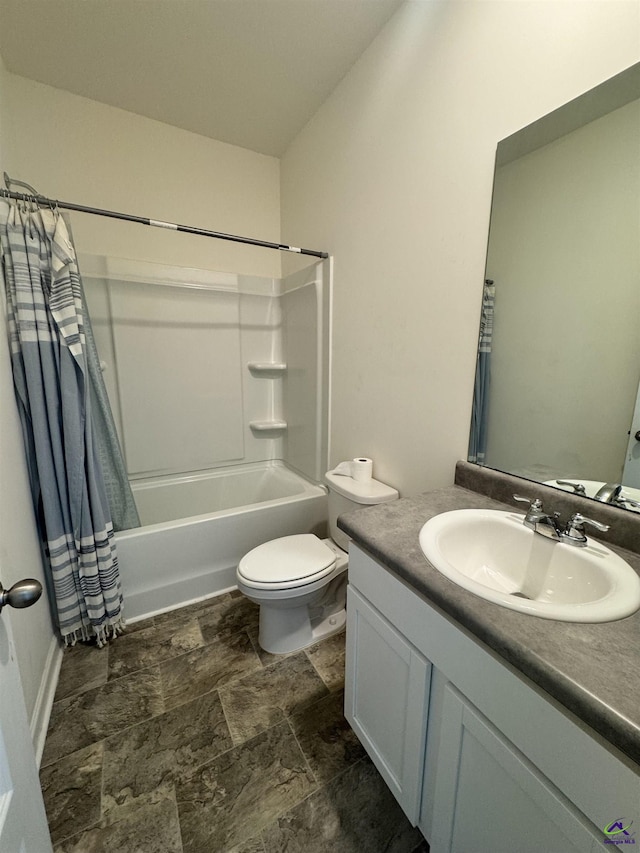 full bathroom featuring shower / tub combo with curtain, vanity, and toilet