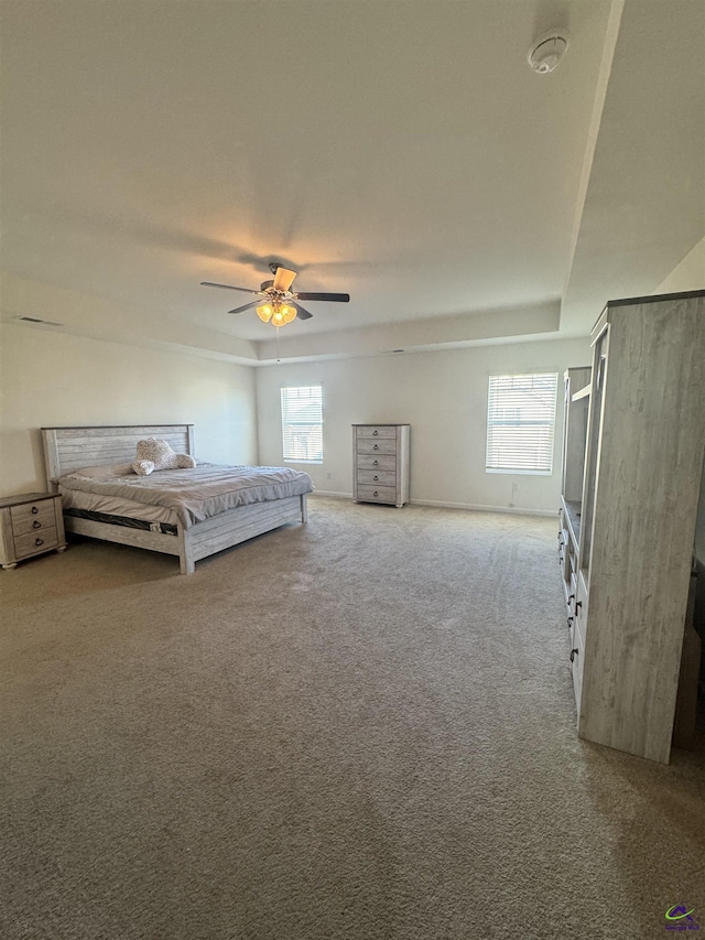 unfurnished bedroom with carpet flooring and ceiling fan