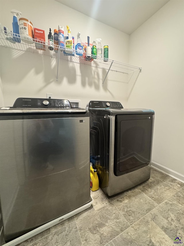 laundry room featuring independent washer and dryer