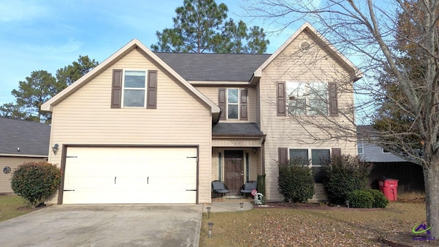 view of front property with a garage