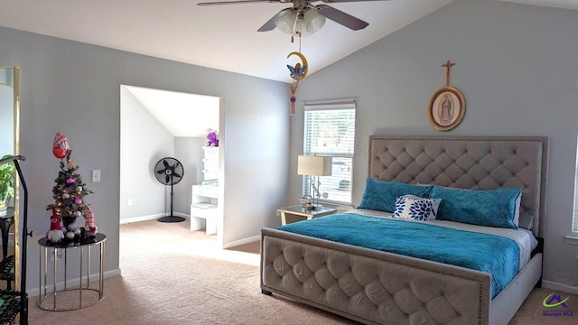 carpeted bedroom featuring ceiling fan and vaulted ceiling