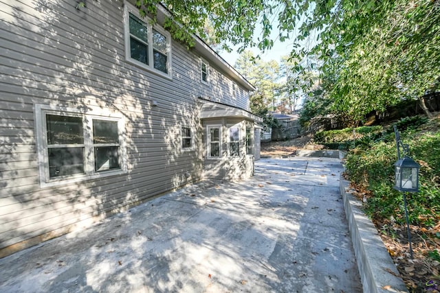 view of home's exterior featuring a patio area