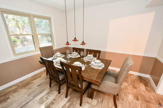 dining area with light wood-type flooring