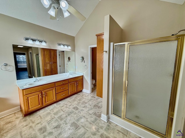 bathroom with walk in shower, vanity, ceiling fan, high vaulted ceiling, and toilet