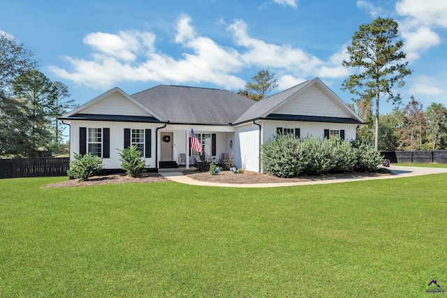 ranch-style home with a front yard