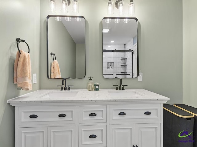 bathroom with vanity and walk in shower