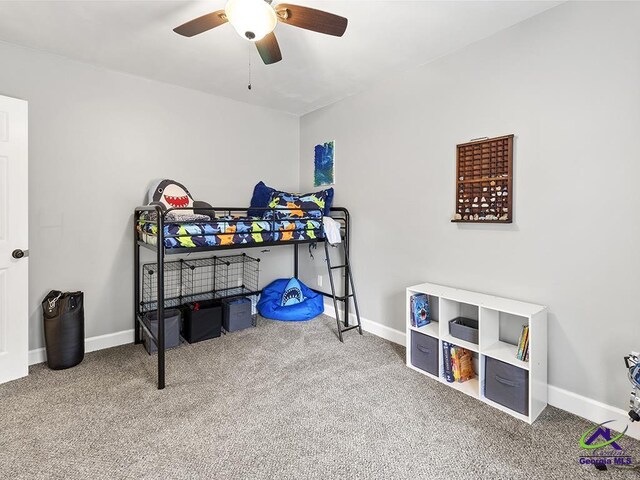 carpeted bedroom featuring ceiling fan