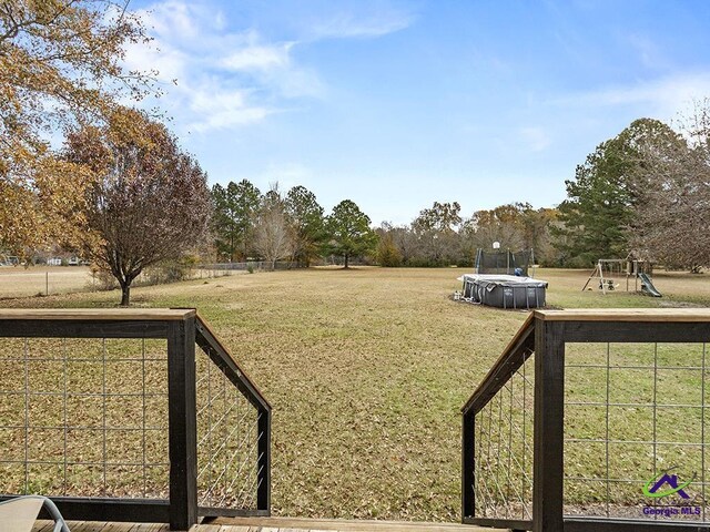 view of yard featuring a playground