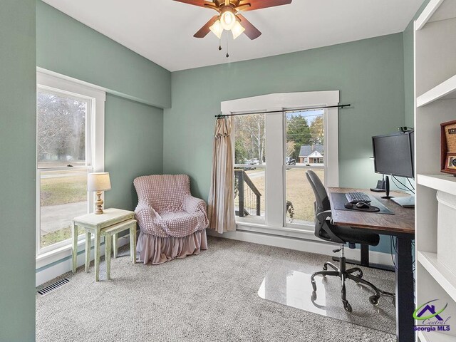 office space with carpet flooring and ceiling fan