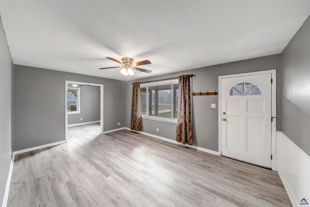 entrance foyer featuring light wood-type flooring and ceiling fan