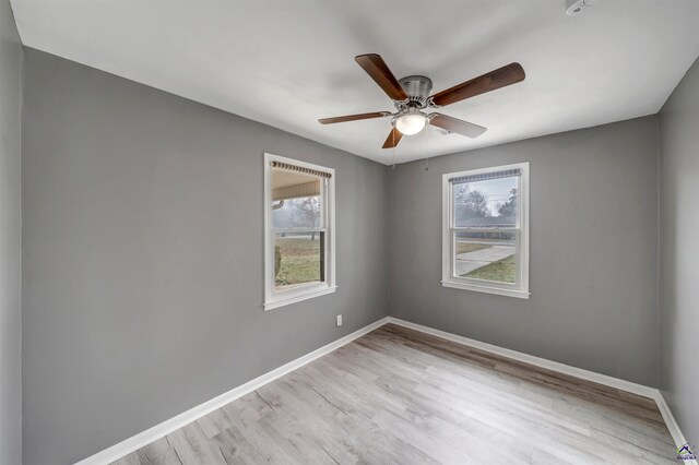 unfurnished room featuring ceiling fan and light hardwood / wood-style flooring