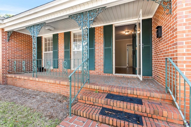 doorway to property featuring a porch