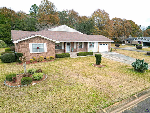 ranch-style house with a porch, a garage, and a front yard