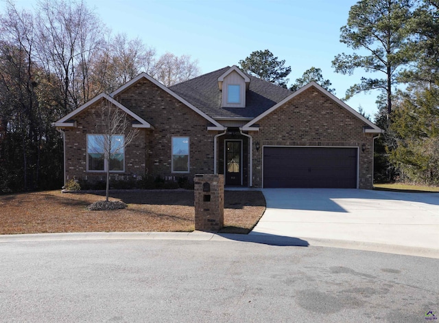 view of front of property featuring a garage