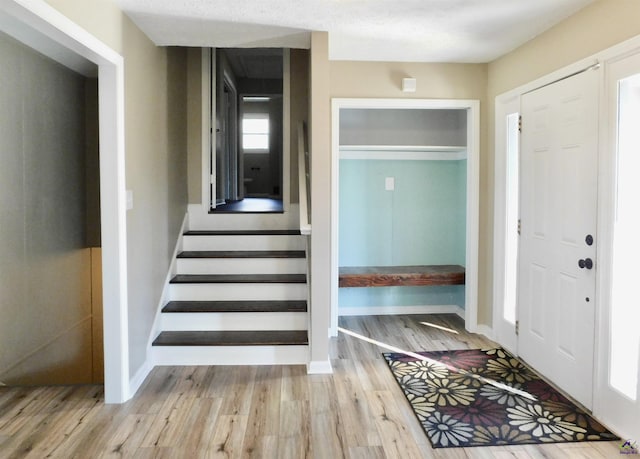 foyer entrance featuring light wood-type flooring